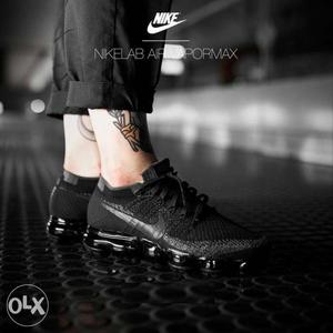 Pair Of Black Nike Shox