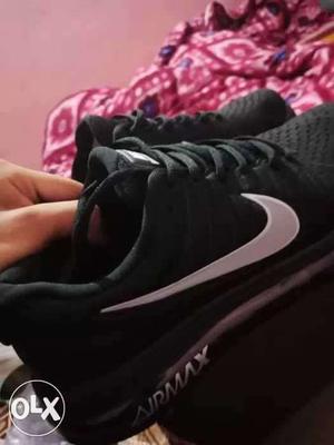 Pair Of Black-and-white Nike AirMax