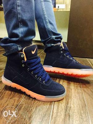 Pair Of Blue Nike High-top Sneakers