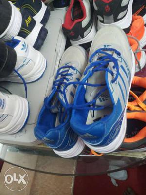 Pair Of Blue-and-white Adidas Sneakers