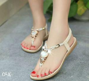 Pair Of White Leather T-strap Sandal
