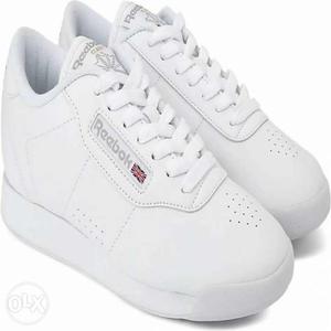 Pair Of White Reebok Athletic Shoes