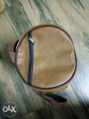 Round Brown And Black Leather Crossbody Bag