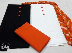 White, Black, And Orange Textiles