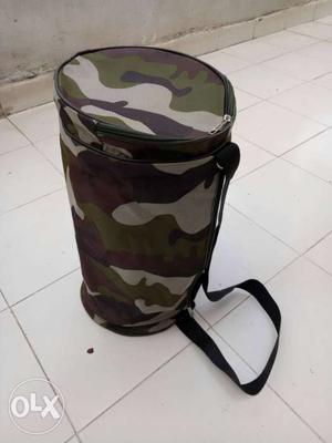 White, Brown, And Green Camouflage Barrel Bag