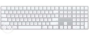 Almost new Apple full size Magic Keyboard + apple wireless