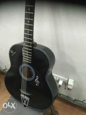 Black color pure acoustic guitar, best in style