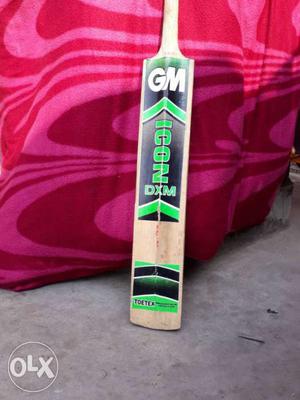 Brown, Black, And Green GM Icon DXM Cricket Bat
