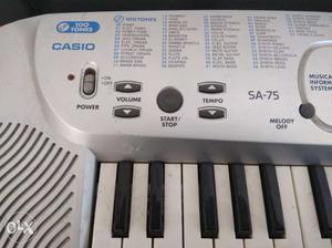 Silver colour Casio SA-75 Electronic Keyboard