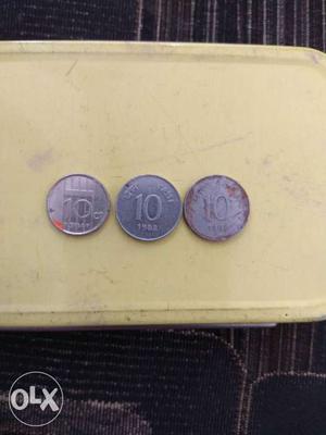 Three 10 Silver-colored Indian Paise Coins
