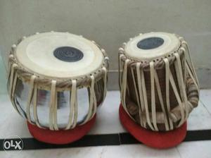 Two Brown Tabla Percussion Instruments