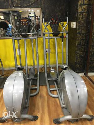 Two Gray Elliptical Trainers