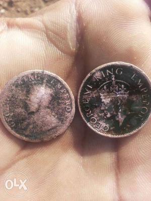 Two Round Silver-colored George VI King Emperor Coins