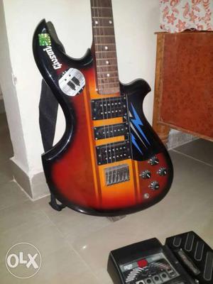 Used Givson electric guitar with belt with cover