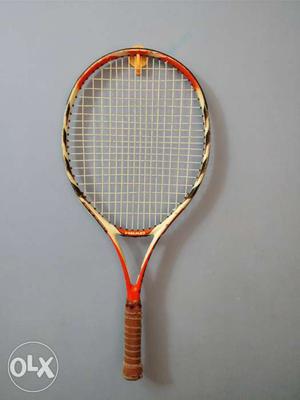 White And Brown Tennis Racket