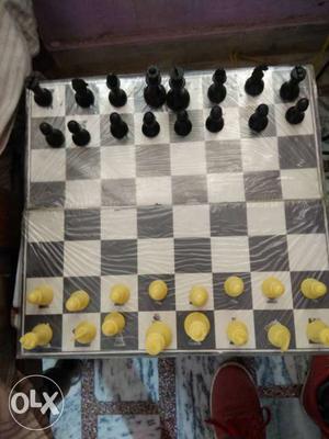 White, Red, And Black Chess Board Game Set
