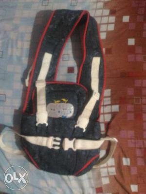 Baby carrier. Very Good Condition. Blue & Red
