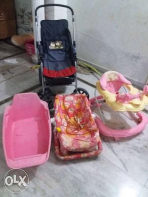 Black Strollers, Pink And Yellow Walker, And Pink Bather