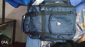 Blue and black backpack with water proof material. 2 months