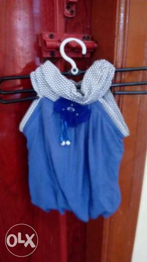 Each 60rs 2 tops n 1 frock for kids up to 1and a