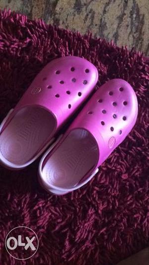 Pair Of Purple Crocs Rubber Clogs