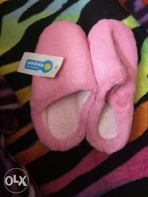 Pink colored fur hot slippers