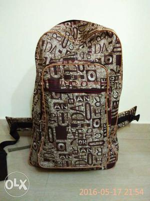 White And Brown Backpack