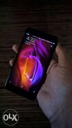 Black Redmi note 4 with 4gb and 64gb memory.