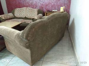 2 two seater sofa. heavy frame. with center table