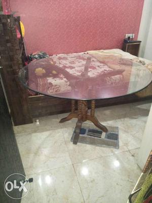 4 seater round dining table. with four wooden