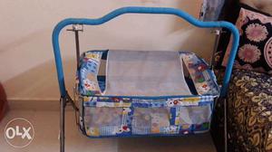 Baby cradle. With bed and mosquito net cover and