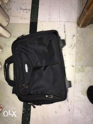 Black Wheeled Luggage Bag