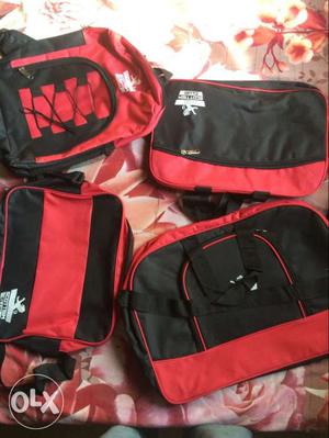 Four Black And Red Backpack And Duffle Bags