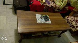 Heavy wooden center table in good condition only in Rs