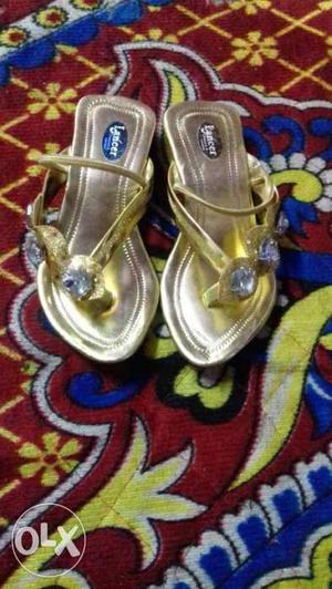 New golden colour baby girl sandal size 5 at Ideal shop