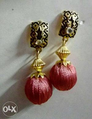Pair Of Gold-colored And Pink Fabric Earrings
