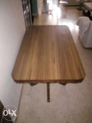 Rectangular Brown Wooden Table.