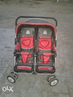 Red And Black Twin Stroller