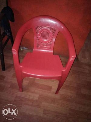 Red And Brown Plastic Chair