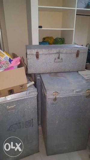 Three Gray Metal Boxes