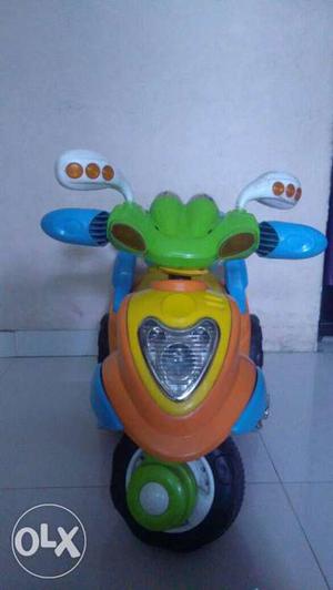 Toddler's Blue And Yellow Ride-on Motorcycle