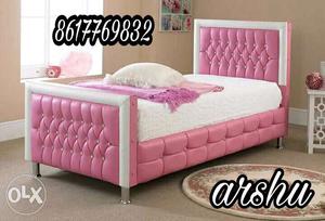 Upholstered Pink And White Bed Frame