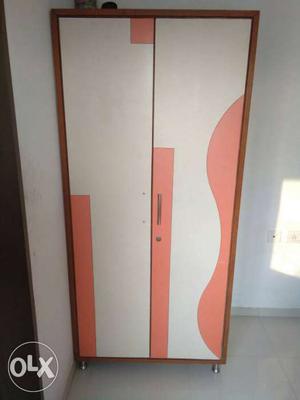 White And Orange Wooden Cabinet