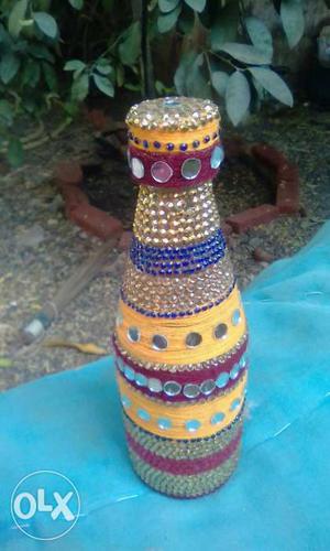 Yellow, Blue, And Brown Beaded Decorative Botle