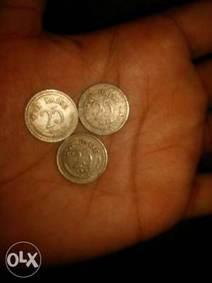 3 round coins of 25 paisa 1 of  era and