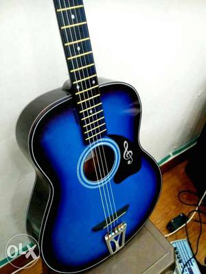 6 strings acoustic guitar for sale, very good