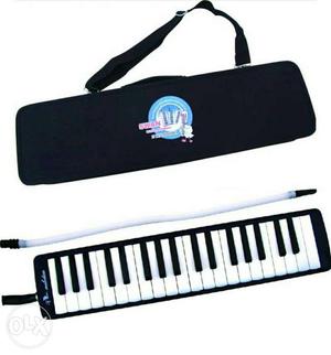 Black And White Melodica With Bag