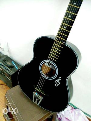 Black color acoustic guitar in half price, best