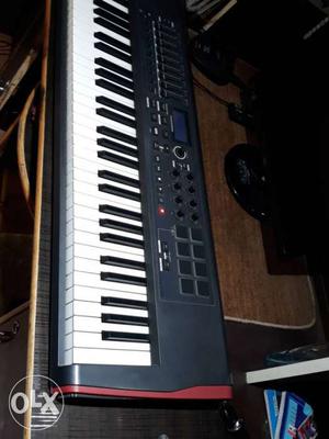 Novation impluse 61 aftertouch midi controller.