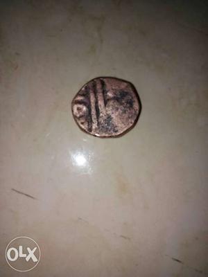 Old copper coin from Shivaji Maharaj proud